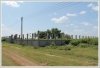 Land by Mekong with wall fence about 18km from city center