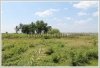 Land by Mekong with wall fence about 18km from city center
