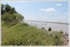Land by Mekong with wall fence about 18km from city center