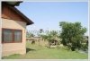 New house with large garden by the right paddy in Phonsavath village