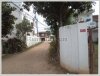 Land with an wooden house on quite large land for sale