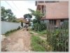Land with house for sale near Thatluang stupa