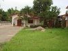 Large land with a villa near main road
