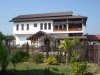Modern house close to rice paddy