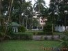 Land with Colonial House near main road for sale