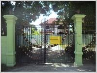 House in town with trees around