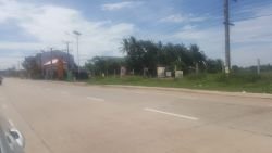 Land plots on a large nature land next to concrete road for rent